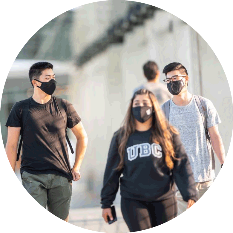 Masked students walking